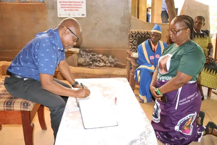 VP signing in visitors book at TA Nthache headquarter